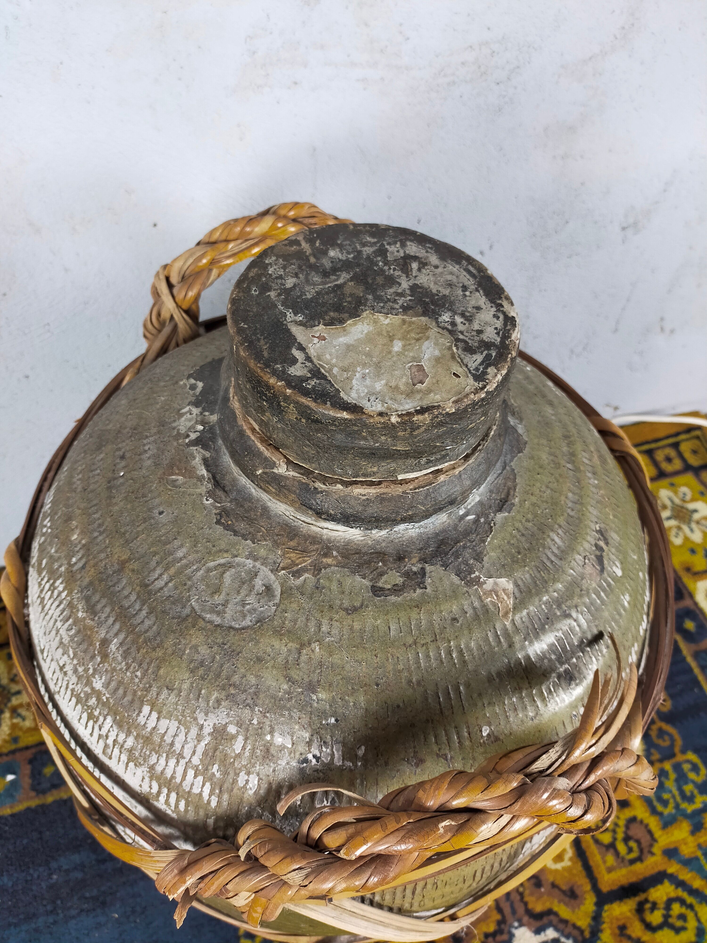 19th century terracotta and rattan jar