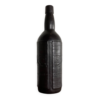 Repoussé leather bottle