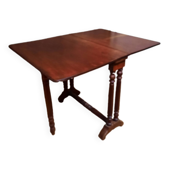 Drop-leaf table called get leg