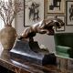 Large Art Deco bronze patinated Jaguar sculpture on an architectural base.