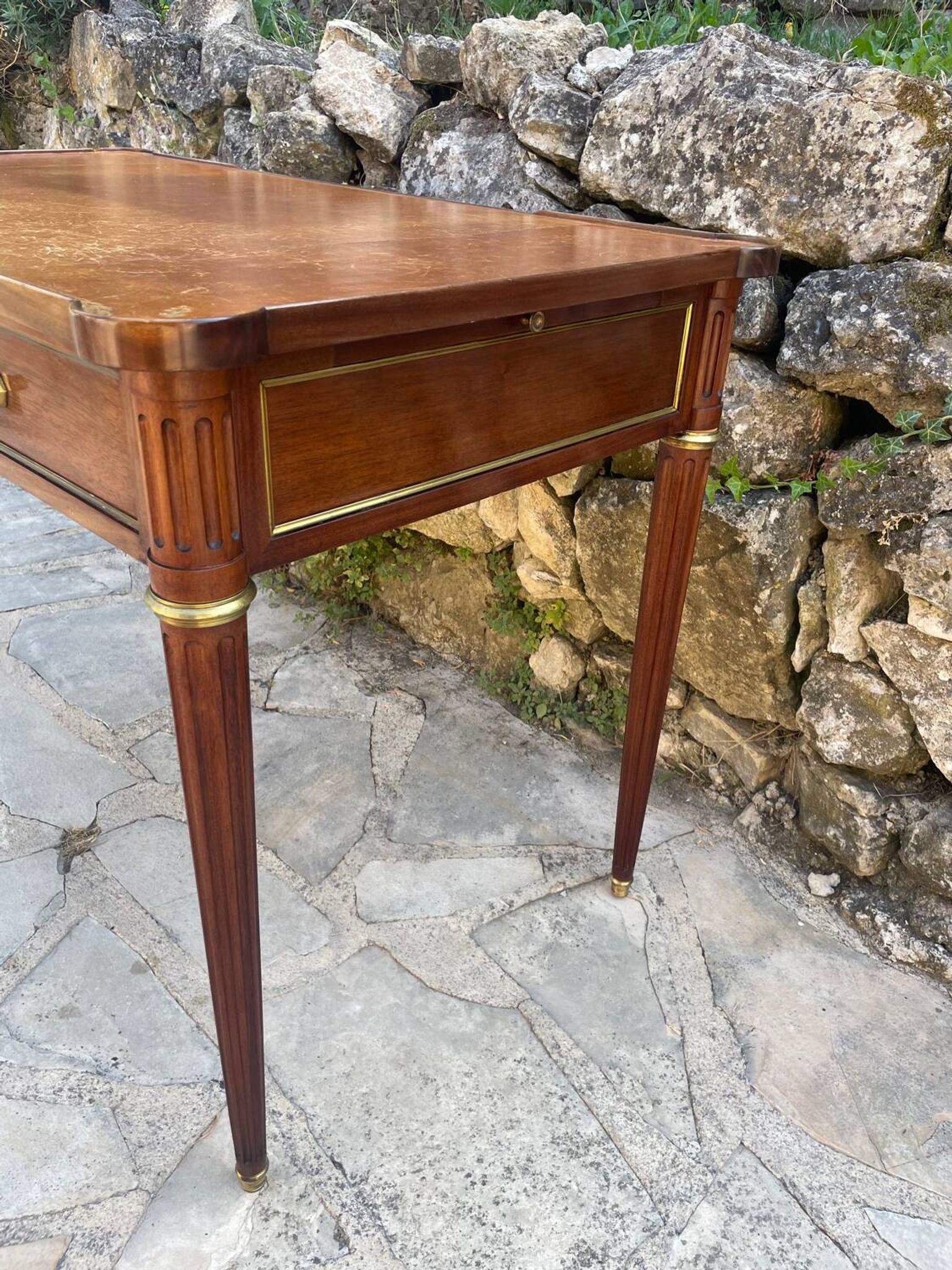 Louis XVI style mahogany flat desk from the late 19th century