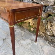 Louis XVI style mahogany flat desk from the late 19th century