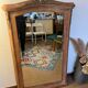 Grand miroir ancien bois patiné et dorure glace biseautée