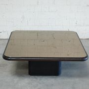 Table basse plateau miroir et cuir