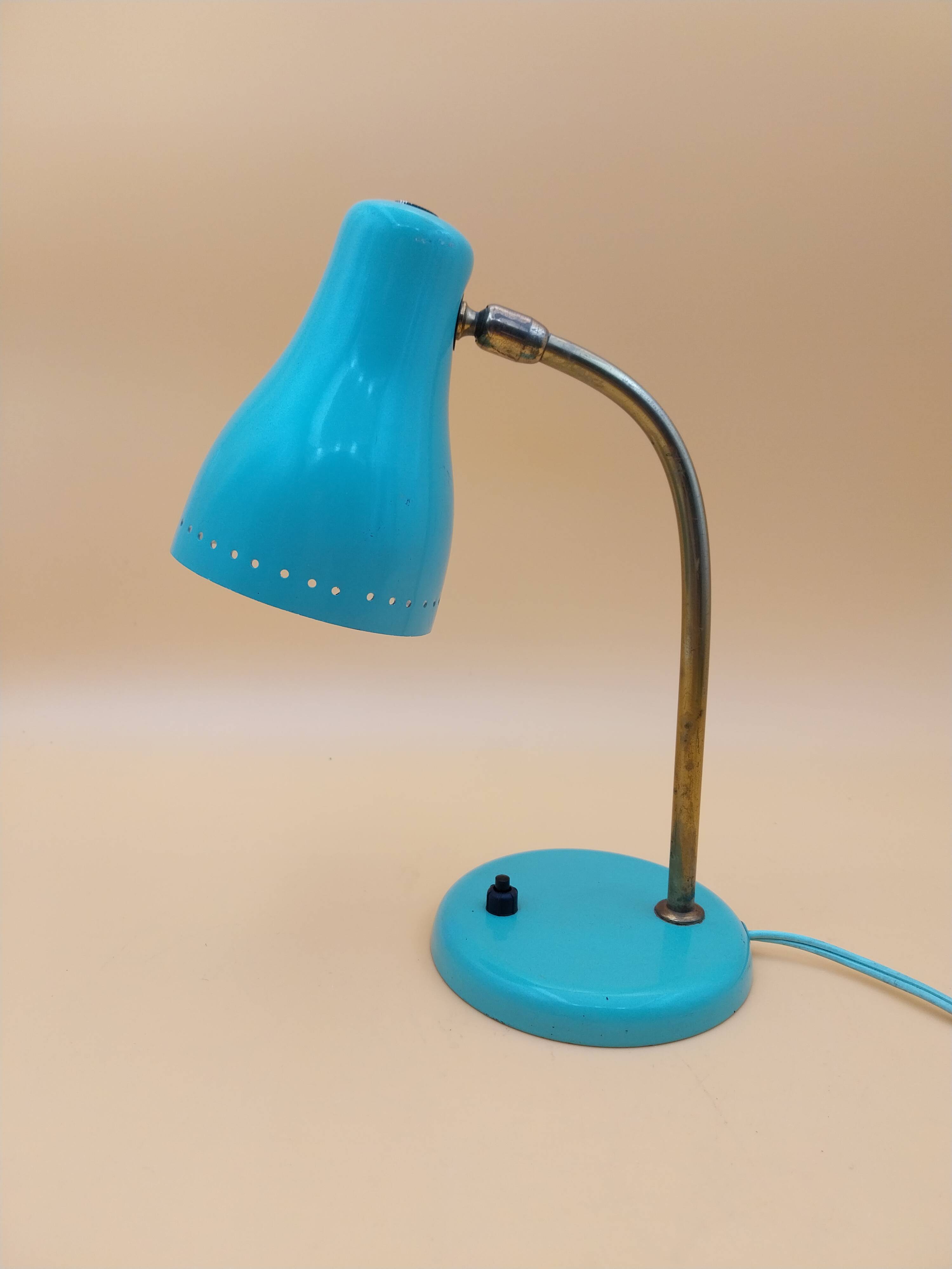Green brass desk lamp with a goose neck on a ball joint from the 1960s.