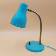 Green brass desk lamp with a goose neck on a ball joint from the 1960s.
