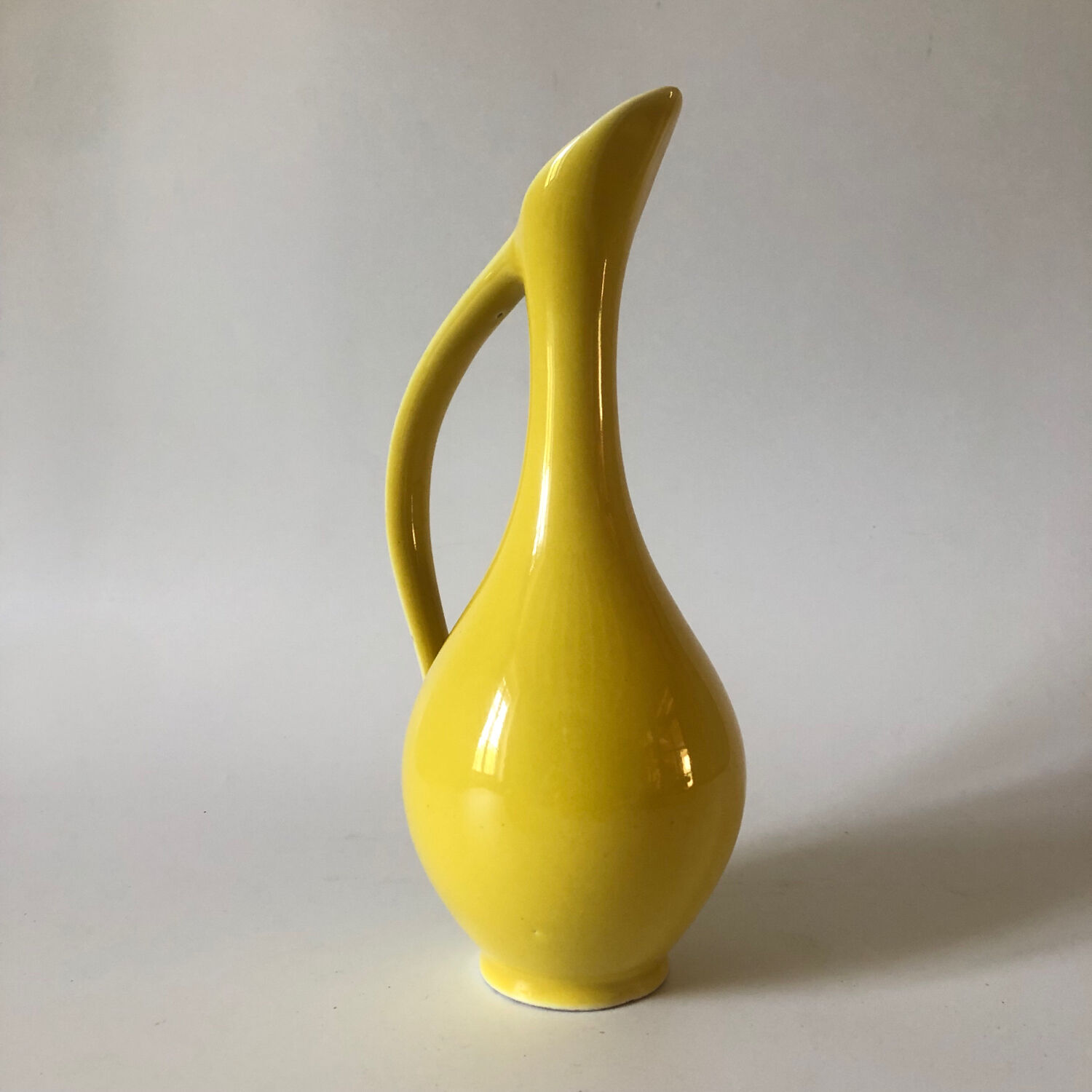 Vintage yellow ceramic decanter