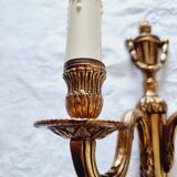 French Empire-style wall sconce or chandelier in bronze with an antique gold patina.