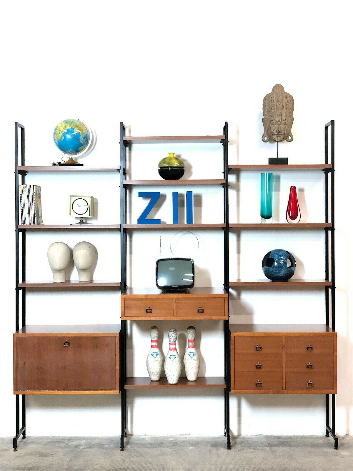 Modular storage unit and teak bookcase. Italy, 60s