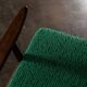 Boomerang chair in green fabric