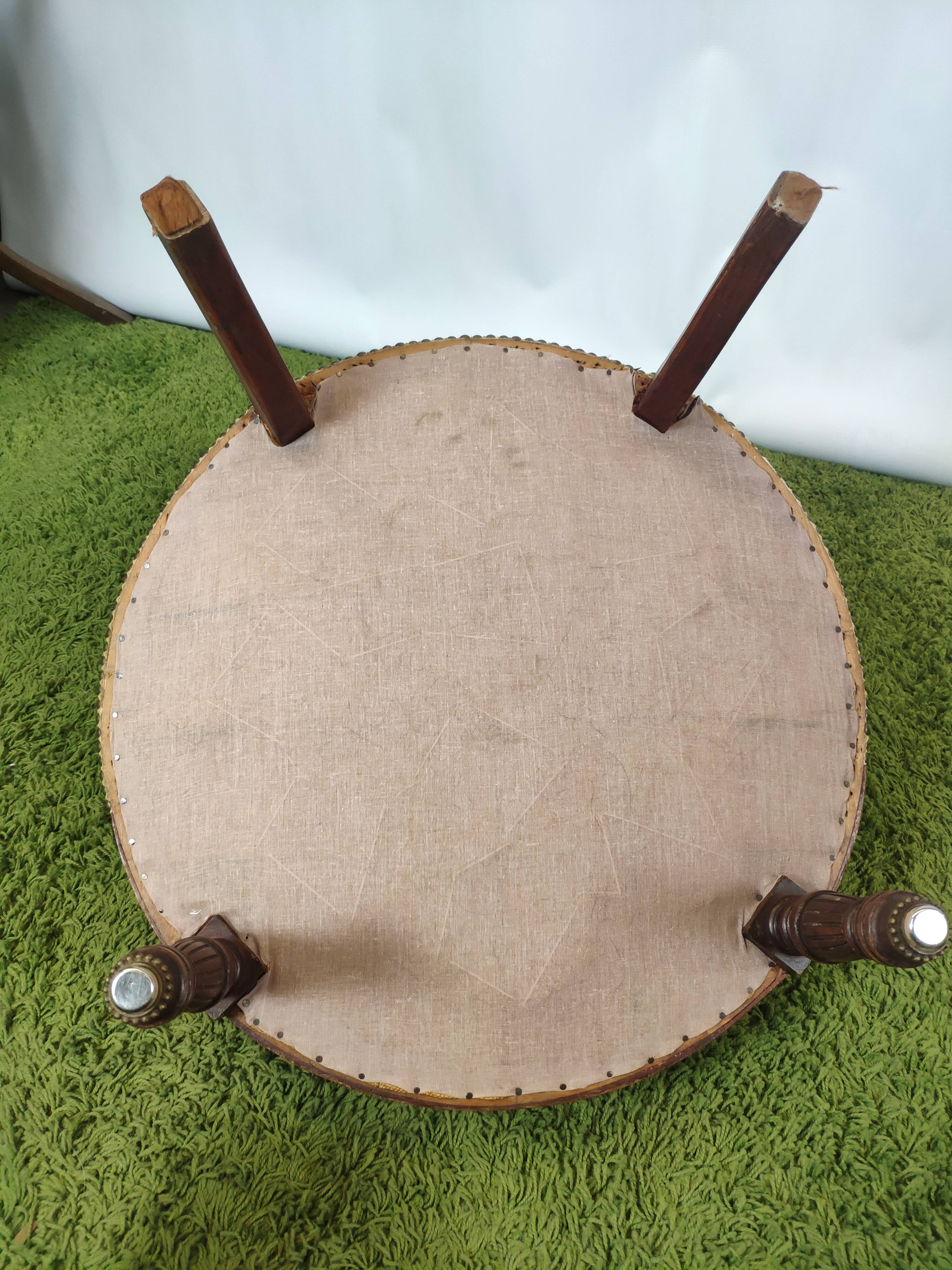 Old green velvet empire chair