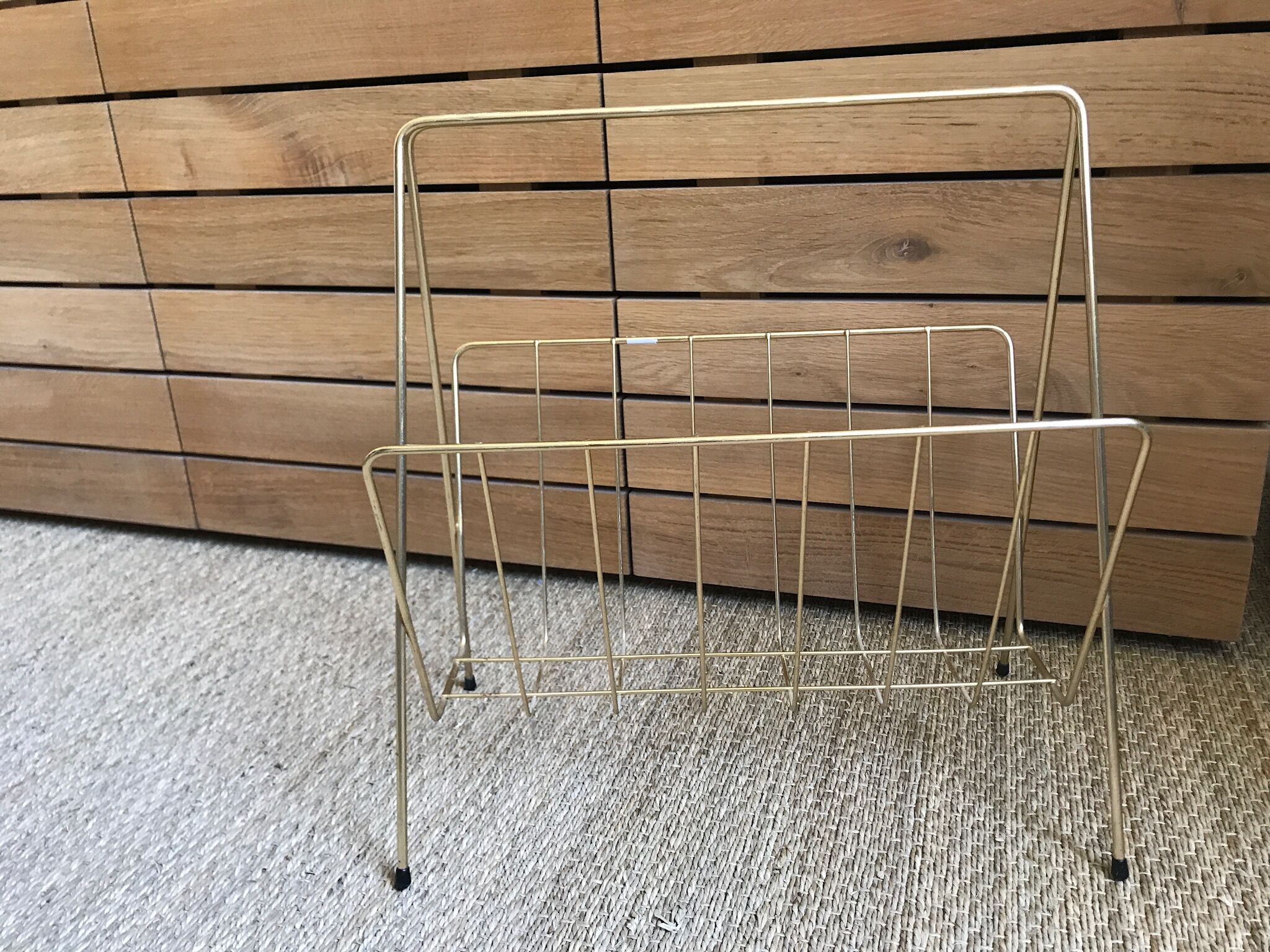 Gold metal magazine rack