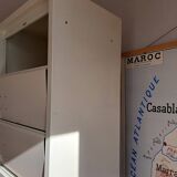 Vintage metal clamshell cabinet