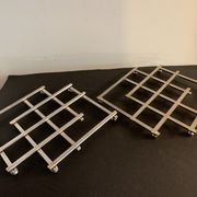 Paire de dessous de plat anciens extensibles métal argenté 1940