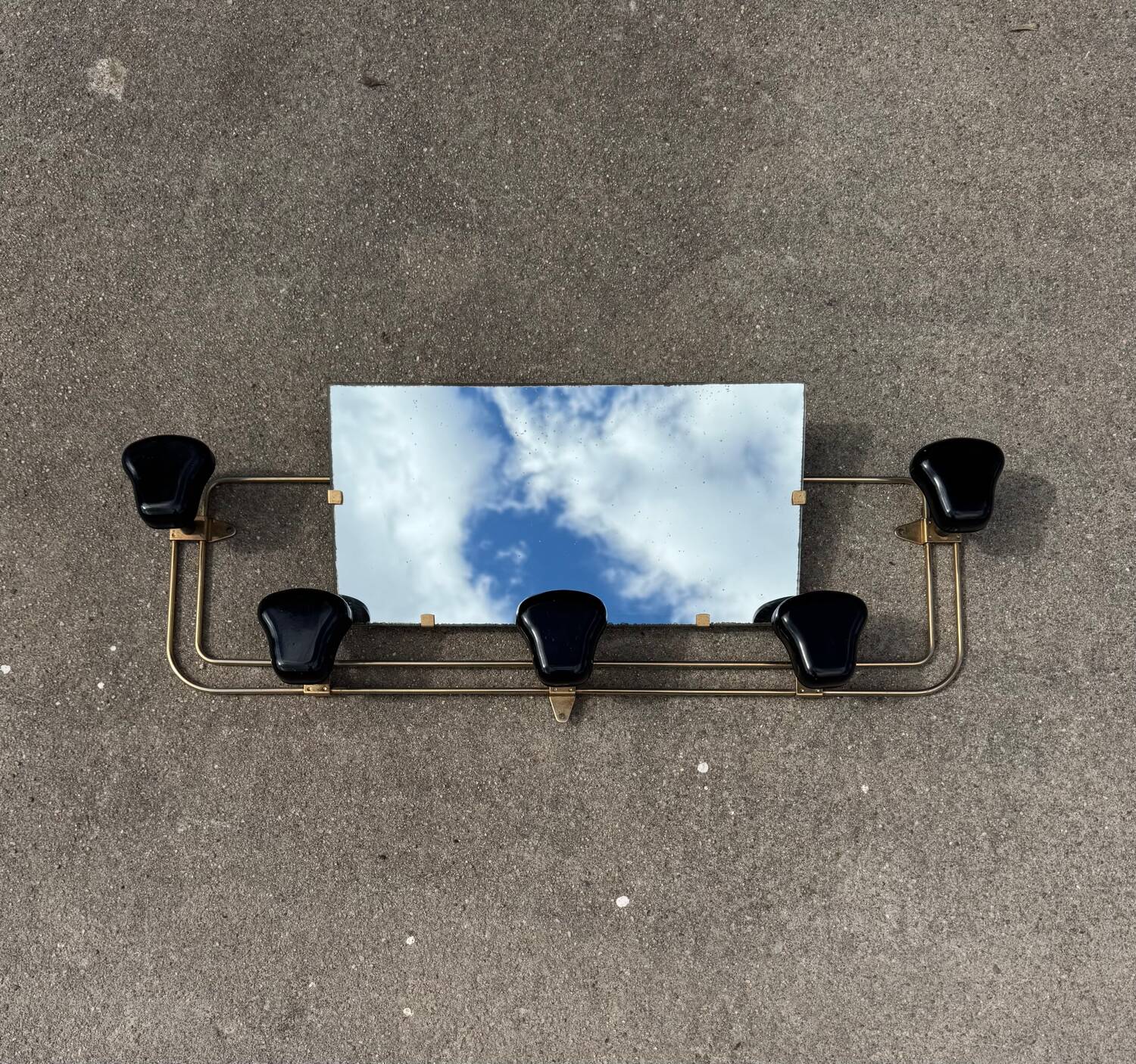 Wall-mounted coat rack mirror from the 1960s.