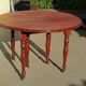 Extendable panel with pans on wheels in cherry