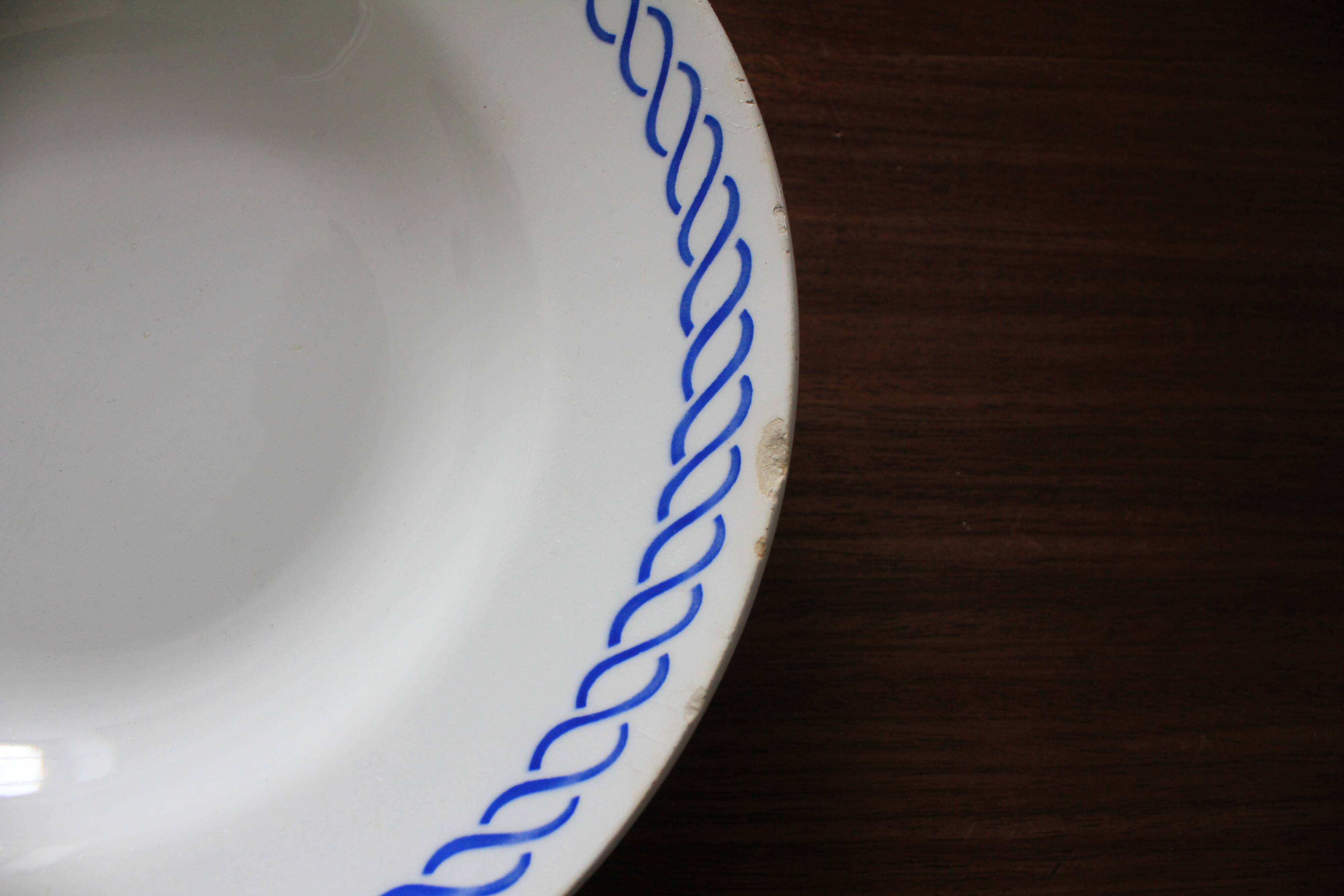 Deep plate with royal blue geometric pattern marked on the back FB 45.