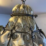 Blown glass and metal lantern