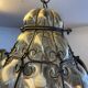 Blown glass and metal lantern