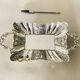 St Louis XV style letter tray, empty pocket, 20th century, in repoussé metal.