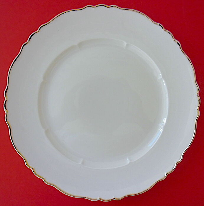Suite of twelve table plates in white porcelain, golden lip