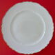 Suite of twelve table plates in white porcelain, golden lip