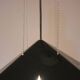 Black plexiglass pendant lamp from the 1980s, mounted on chains, originating from Italy.