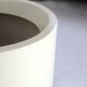 Important cylindrical planter in cream lacquered fiberglass, circa 1970