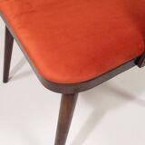Scandinavian design orange papaya shell dining chairs