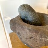 Mortar and pestle in black stone