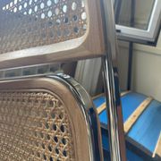 Plia chairs by Castelli in wood and cane.