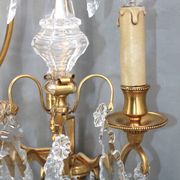 Pair of Louis XVI style gilded bronze & bohemian crystal sconces