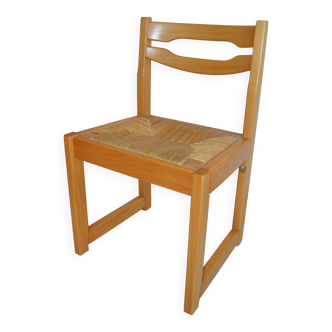 Chair made of solid elm, with a straw seat.