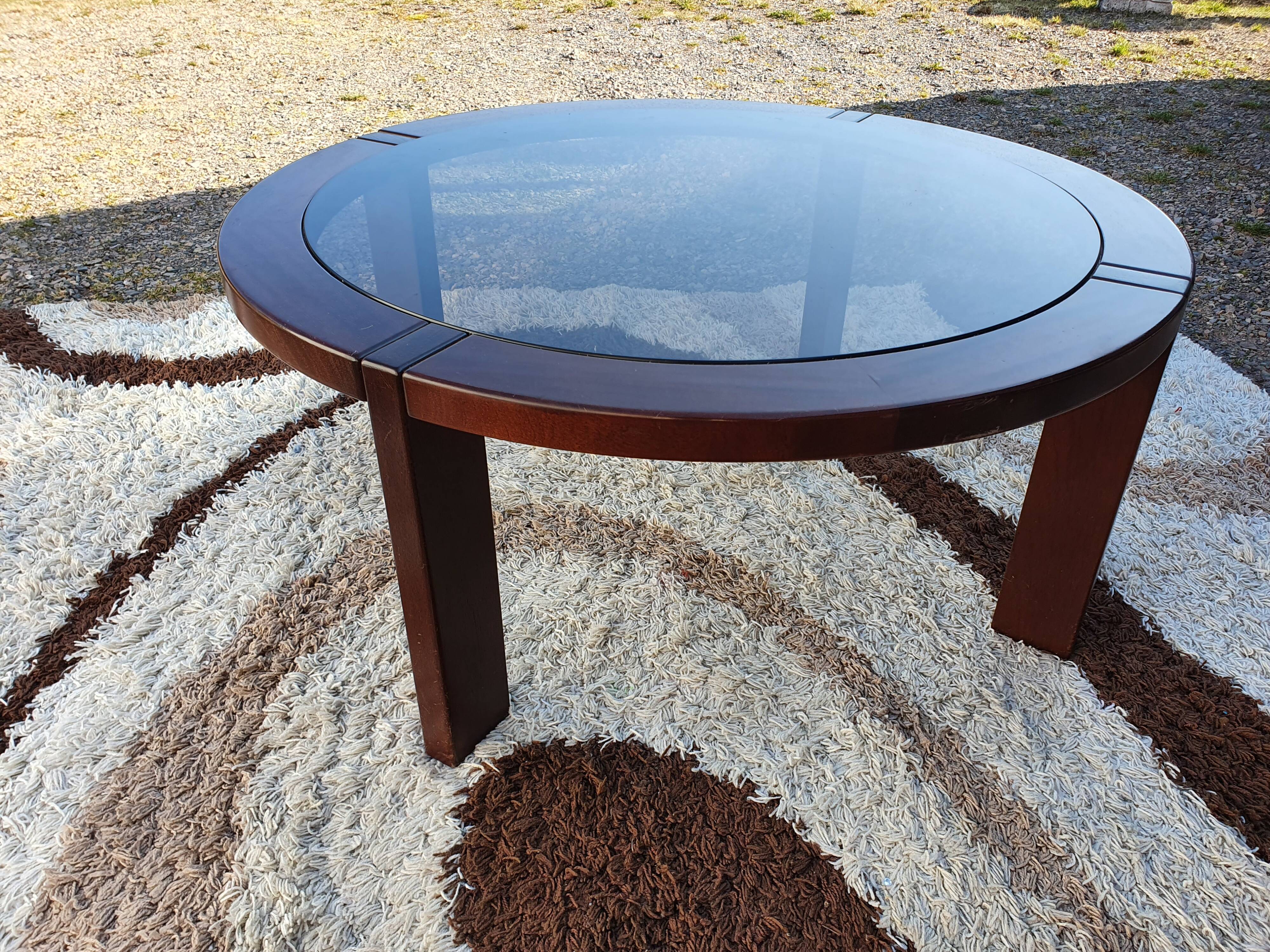 Teak coffee table and smoked glass from the 70s