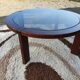 Teak coffee table and smoked glass from the 70s