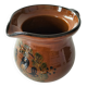 Glazed earthenware pitcher signed HR with a design of stylised birds.