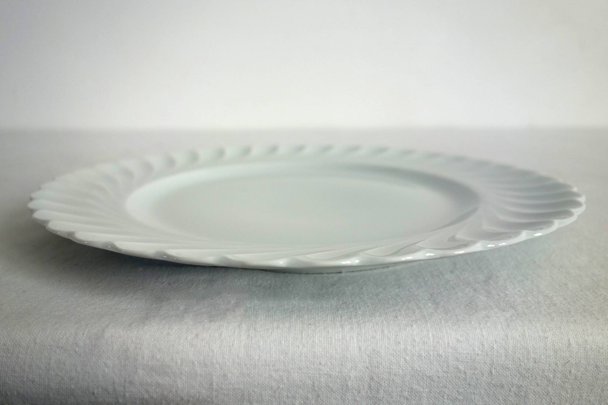 Set of 8 white twisted porcelain dinner plates Limoges Haviland