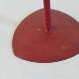 Red metal chandelier for three candles