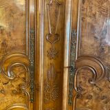 Wedding wardrobe of the Bressan country in walnut and walnut magnifying glass dated 1850