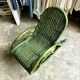 Children's rocking chair in woven wicker and green rattan