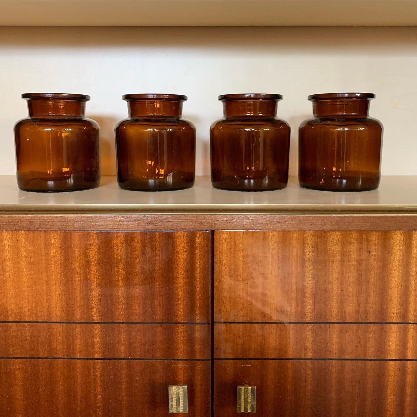 4 amber jars