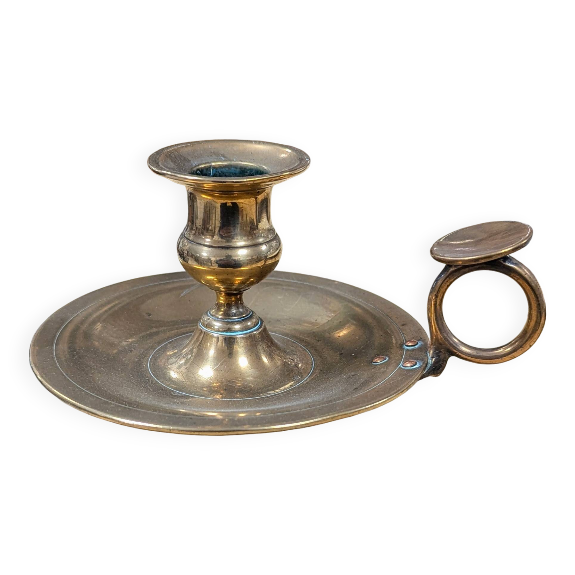 Brass thumb candle holder