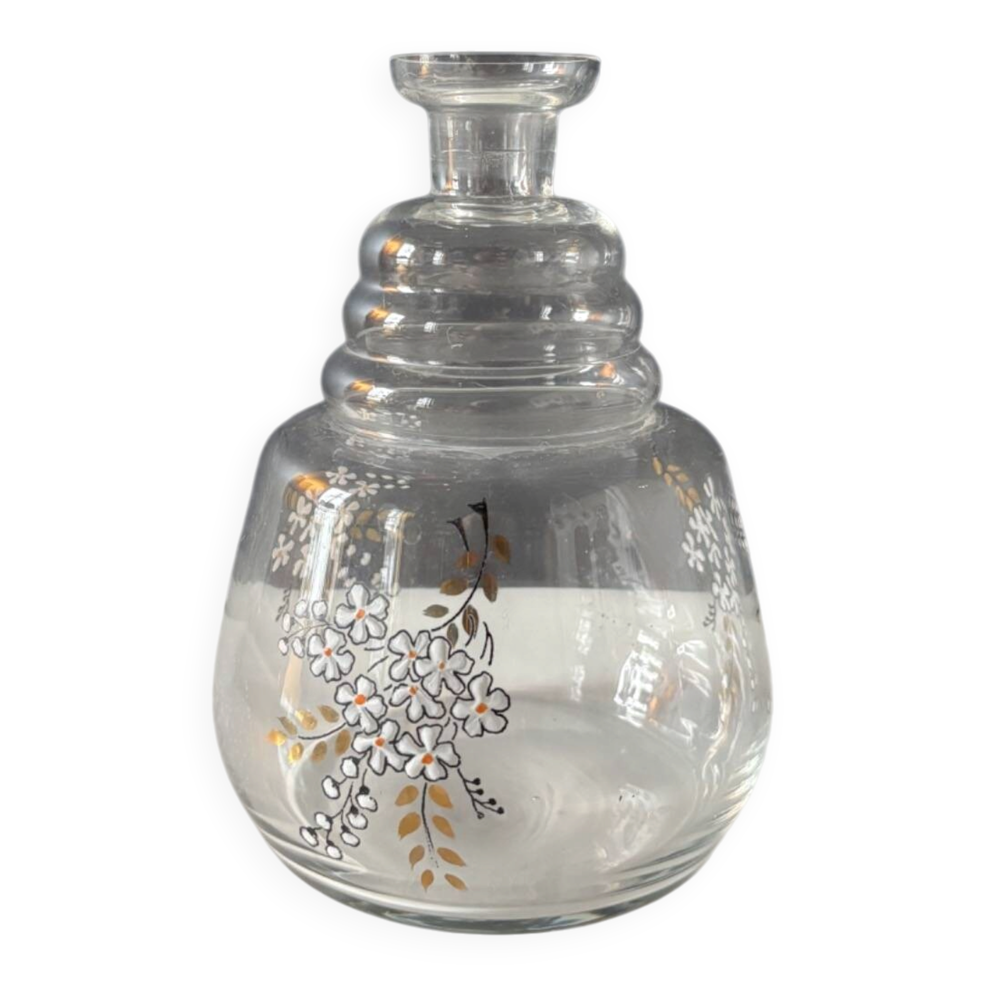 Vintage glass carafe with floral decoration