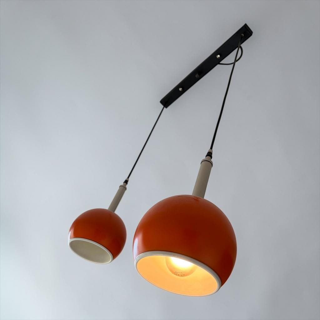 Vintage orange eye ball / suspension with 2 light points.