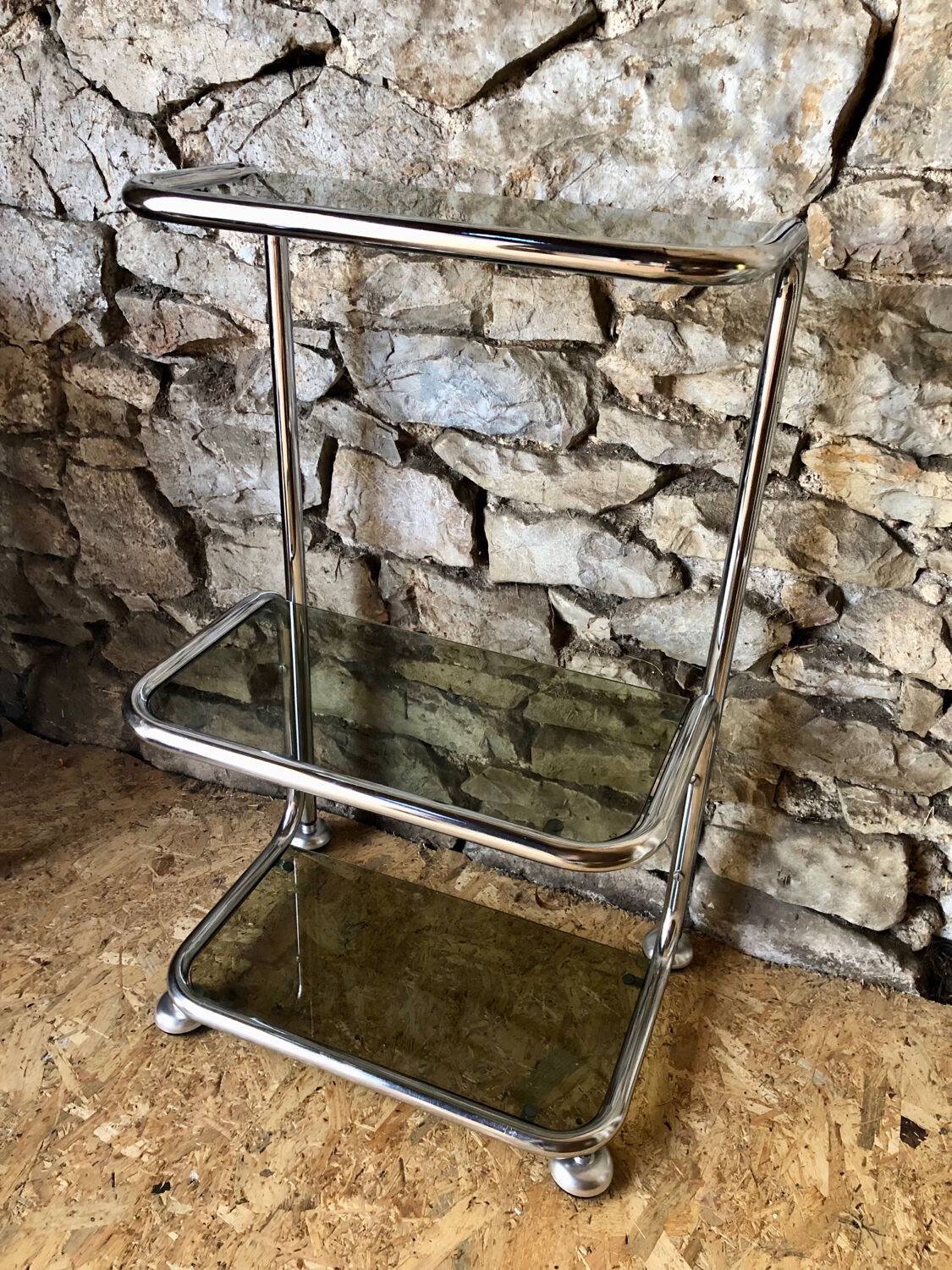Chromed metal shelf and smoked glass