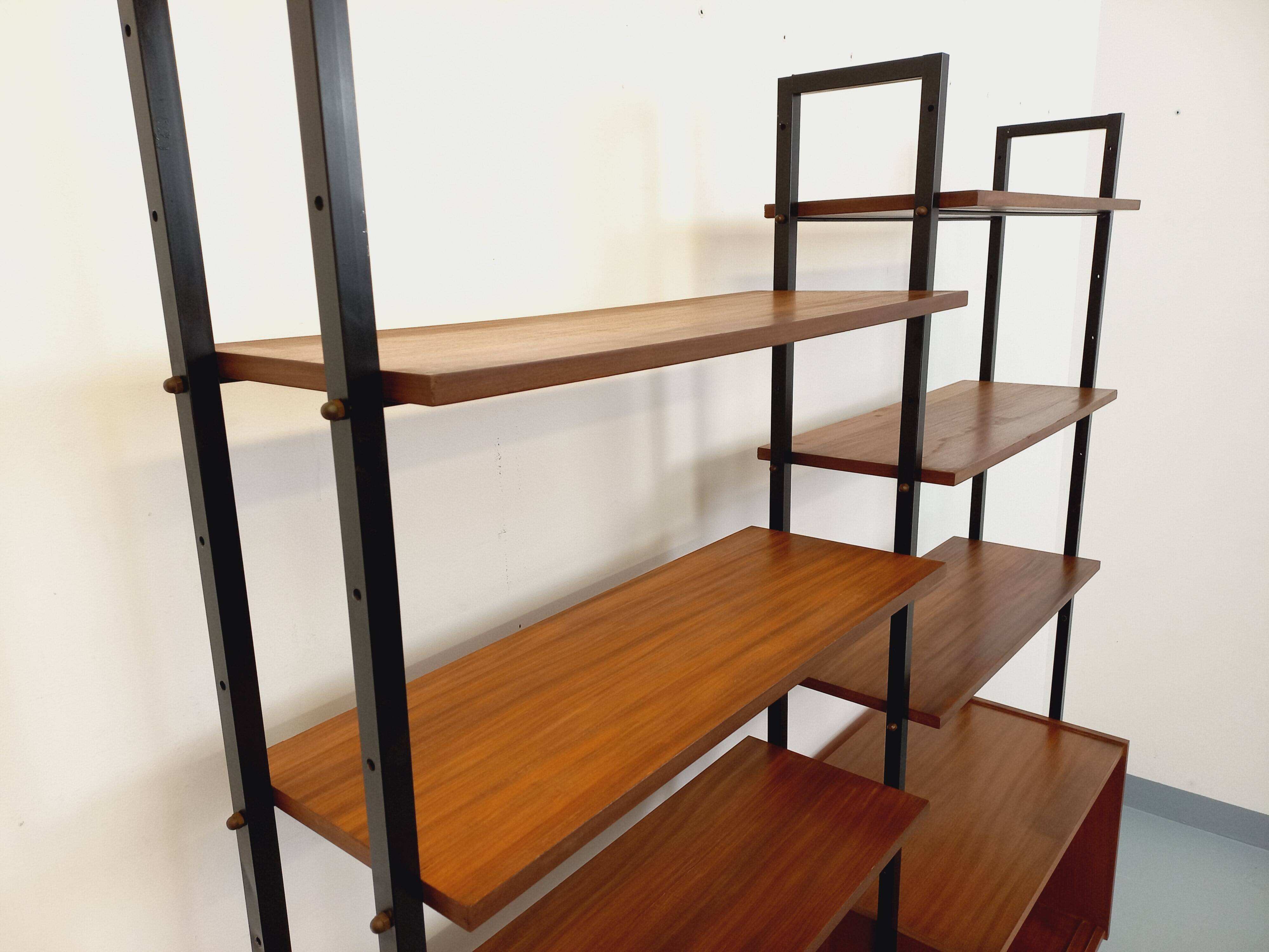 Vintage Italian double modular bookshelf in teak and metal.