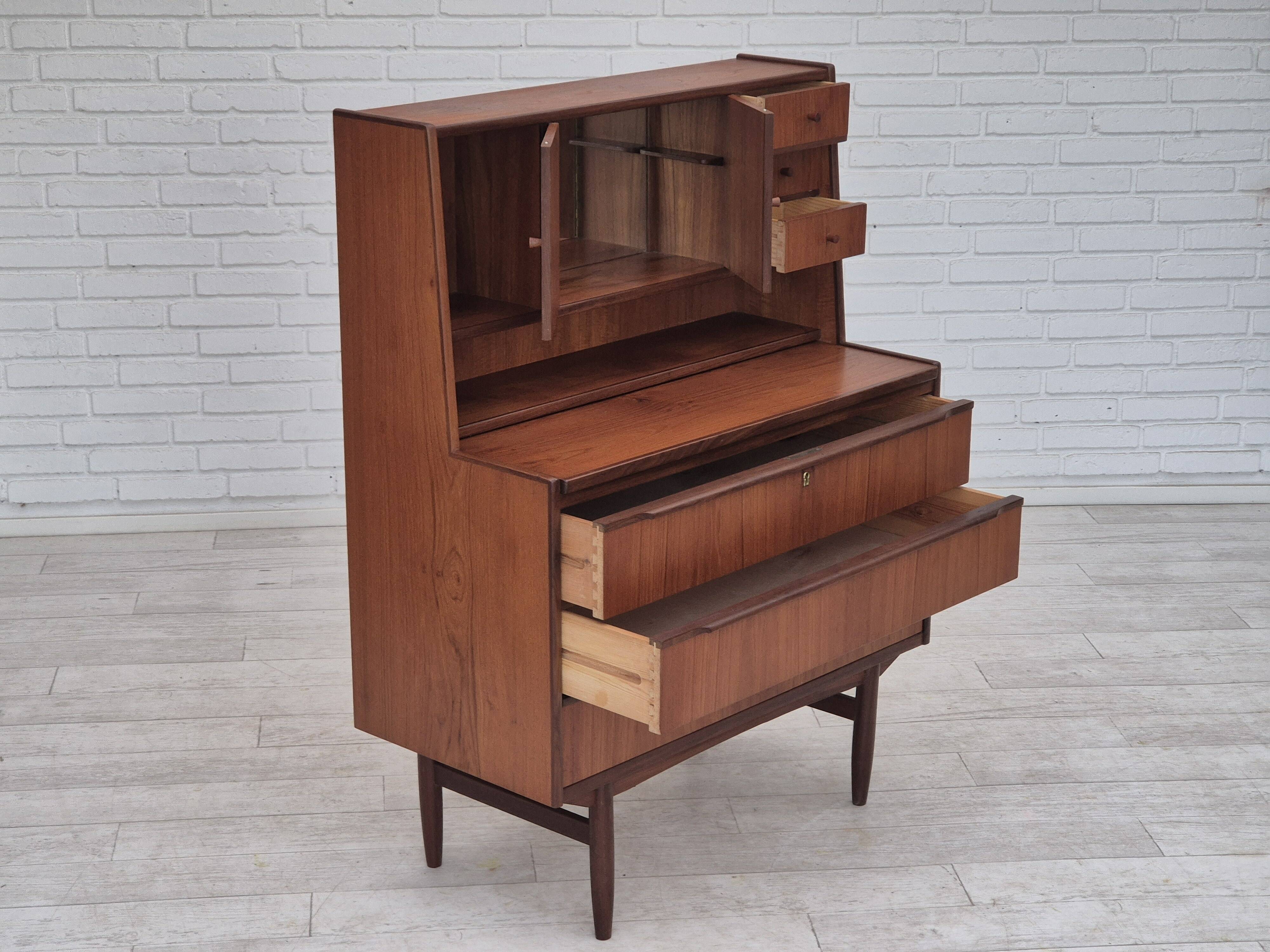 1960s, Danish chest of drawers with a mirror inside, original condition, teak wood.
