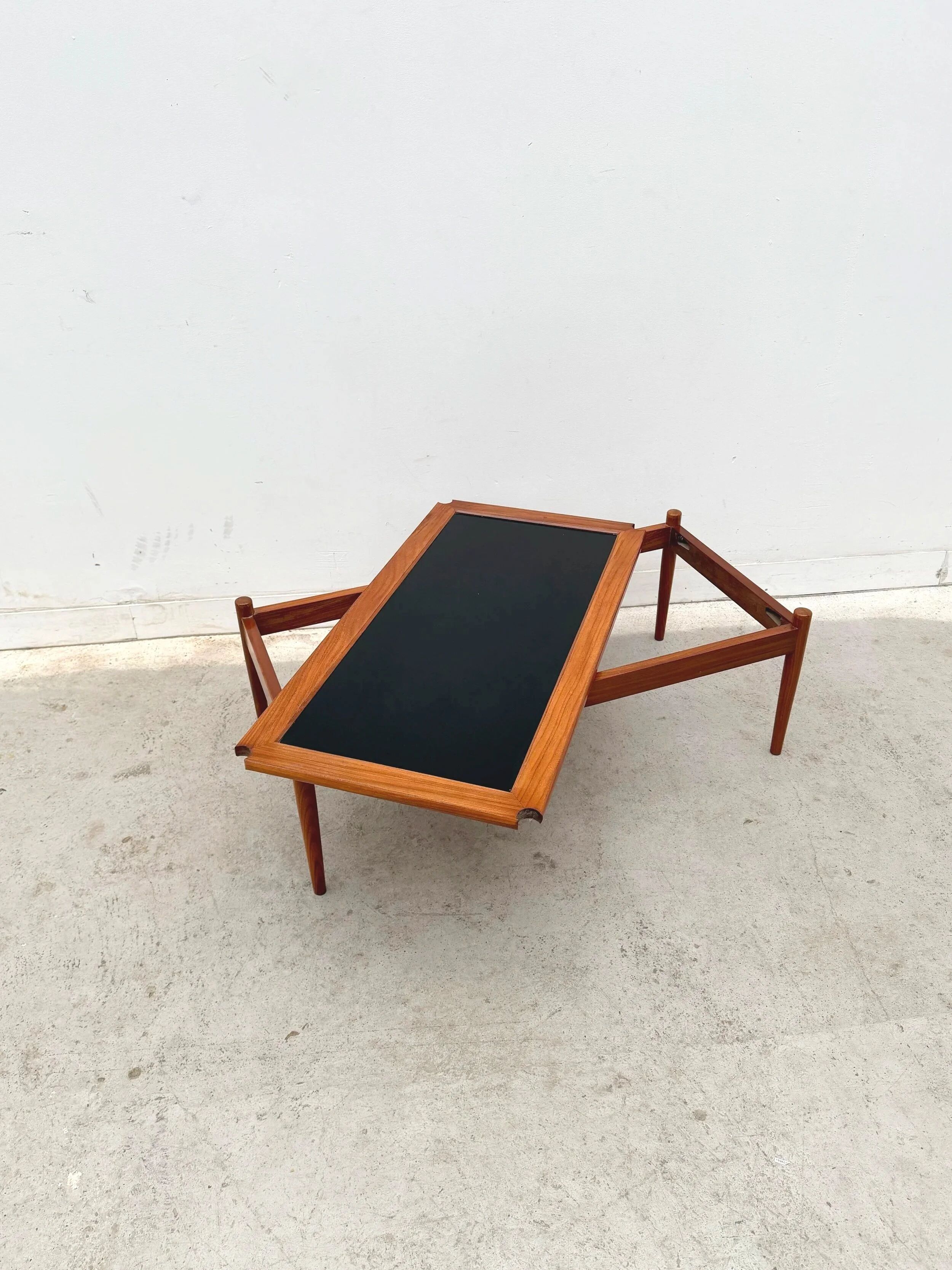 Scandinavian coffee table in teak and black formica, 1960.