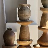 Natural solid mango side table (monoxyle) with conical legs.