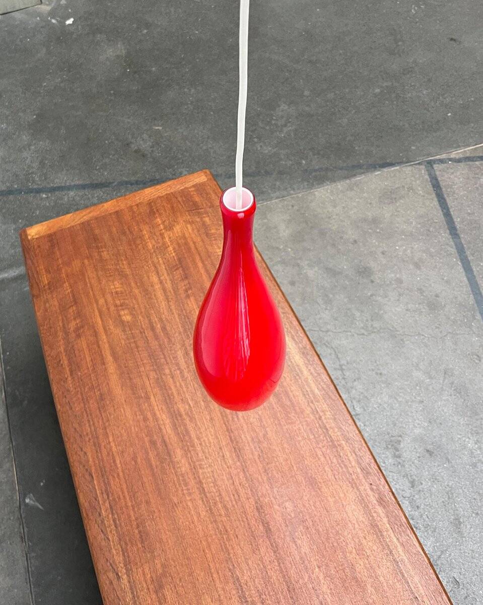 Glass pendant lamp of the mid-century Danish model by Jacob E. Bang for Fog & Mørup and Holmegaard, 1960s.